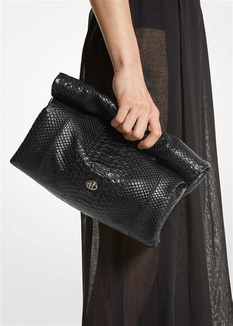 python clutch michael kors|michael kors monogramme python.